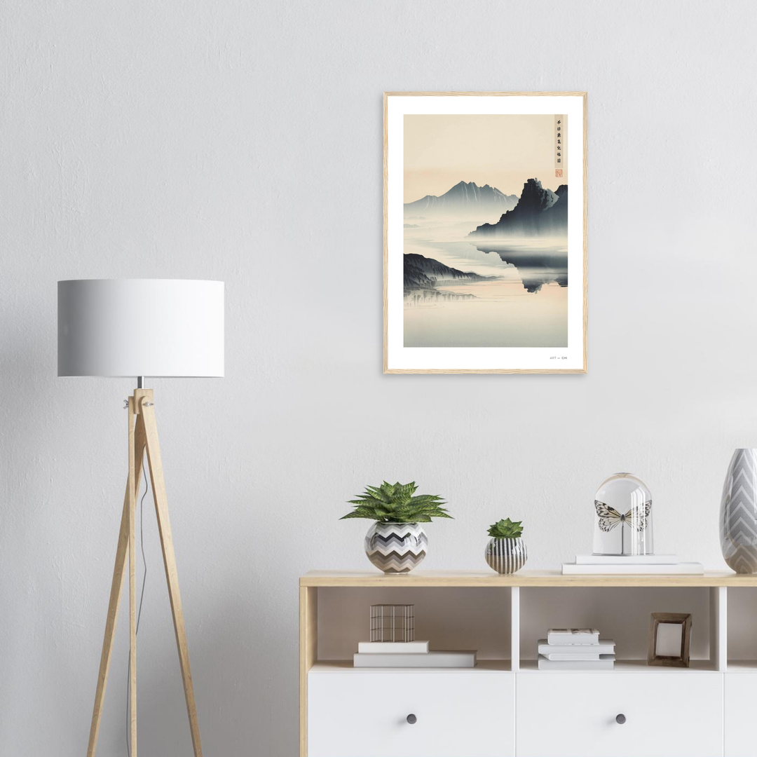 paisaje zen  enmarcado con montañas y agua en calma, inspirada en la pintura japonesa sumi-e; simboliza renovación, serenidad y abundancia
