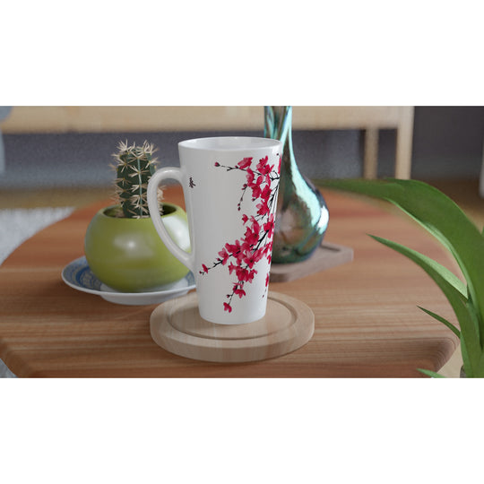 Taza alta con flores de cerezo en escena decorativa con taza y platillo